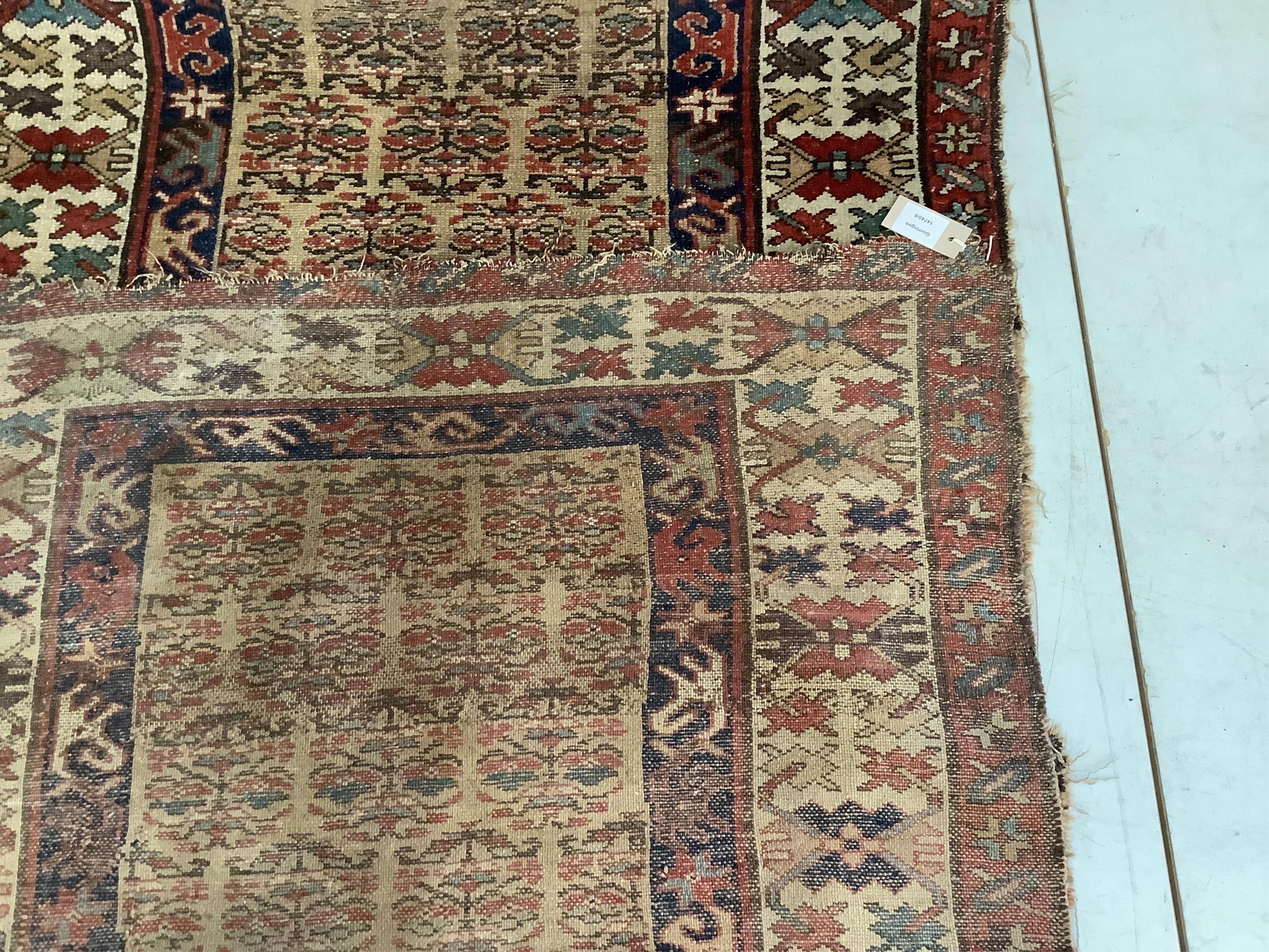 A Caucasian fawn ground runner, 405 x 99cm. Condition - fair